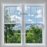 Photo of ComforTech 35 Ceramic window film installed on the bottom half of window and clear glass on top to show window tint shade