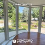 Photo of a dining nook with a beautiful bay window with ComforTech 25 Ceramic Series window film applied.