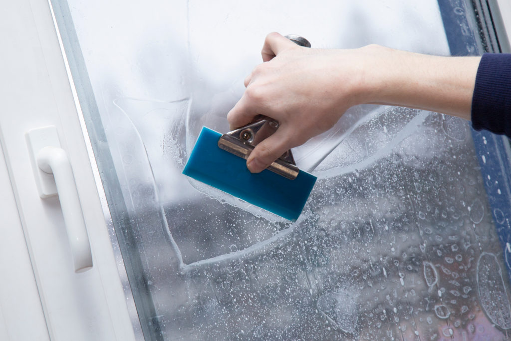 Squeegeeing Window Film