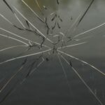 Photo of broken window glass with cracks in glass for Safety Film product on Concord Window Film
