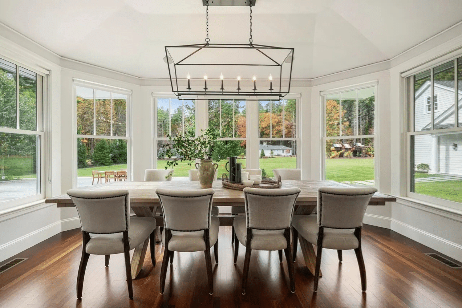 Dining room with many windows ready for the holidays for a post entitled give your windows a glow up