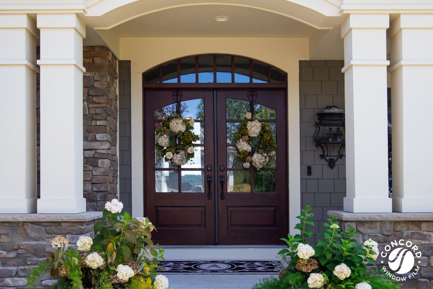 Photo of a beautiful double front entry door for a blog post on how to cover front door windows