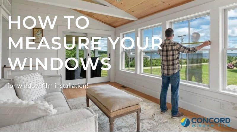 Man measuring windows for window film installation
